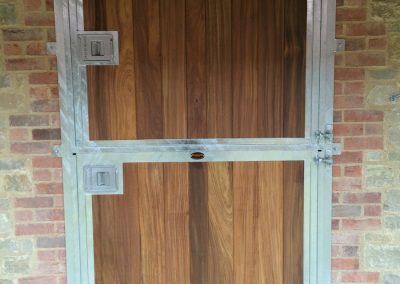Deluxe Exterior Top and Bottom Door in Hardwood
